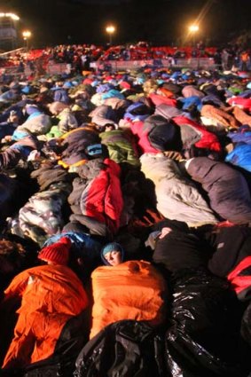 Cold dawn: Asleep at Anzac Cove before this year's ceremony.