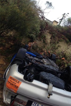 The car plunged 10 metres after crashing through a barrier.