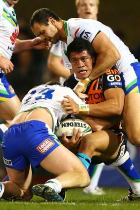 Sauaso Sue of the Wests Tigers finds himself in a bind.
