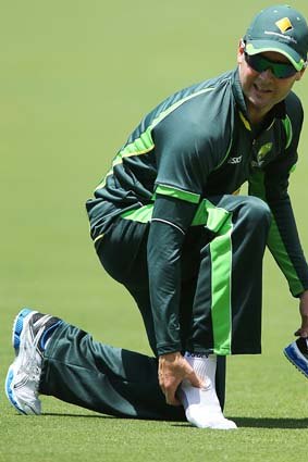 Michael Clarke inspects his ankle during a nets session at Adelaide Oval on Monday.
