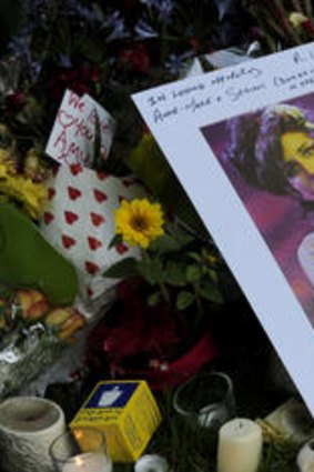 Flowers, pictures and messages are left in tribute to late soul music and pop star.