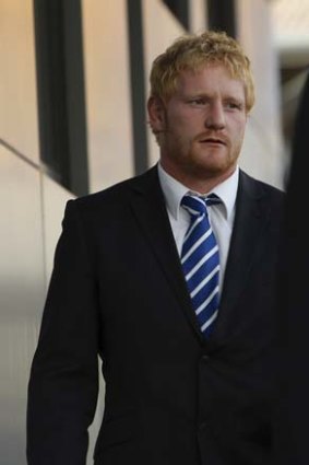 Out for 12 weeks: James Graham arrives at the NRL headquarters yesterday for the judiciary hearing.