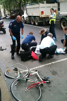 A semi-trailer driver failed to stop when a cyclist was hit this morning, witnesses say.