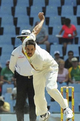 Take that: Mitchell Johnson bowls to South Africa's opener Alviro Petersen (not in pic) on the fourth day of the first Test.