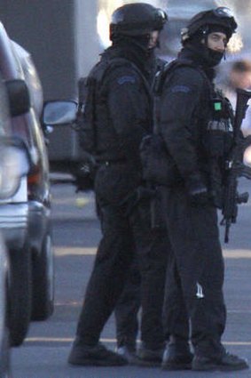 Ready: Police Special Operations Group officers during the standoff with Antonio ''Mad Dog'' Loguancio in Glenroy.