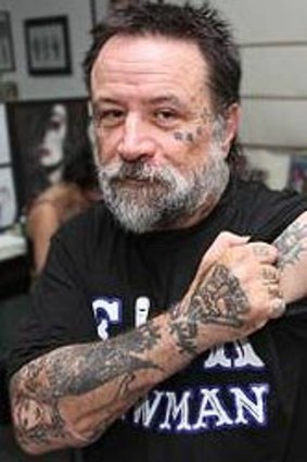 Angelo Garozzo of Caloundra Tattoo Studios is offering free "I PISS ON THE VLAD LAWS!" tattoos.
