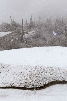 White out ... the 18th green covered in snow.
