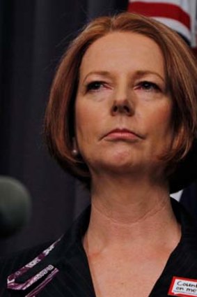 Julia Gillard facing the media on Thursday.