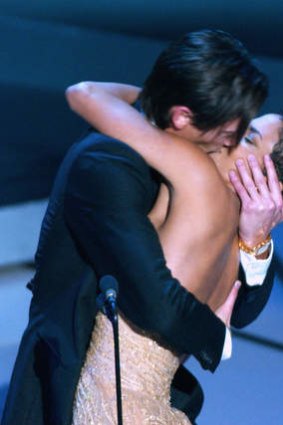 Overwhelmed: Adrien Brody and Halle Berry's famous kiss at the 2003 Oscars, when he became the youngest winner of best actor.