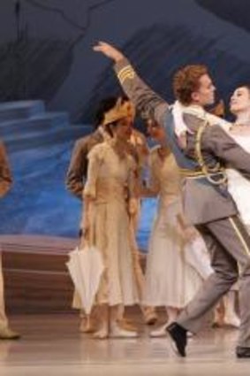 Adam Bull and Amber Scott, front, in the wedding scene from Graeme Murphy's  2013 <i>Swan Lake</i>.