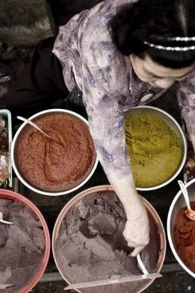 Typical ingredients: A vendor in Thai Street Food.