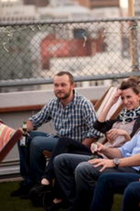 Josh Lawson (third from left) and company in one of the many supposedly glamorous Melbourne locations in the romantic comedy <i>Any Questions for Ben?</i>