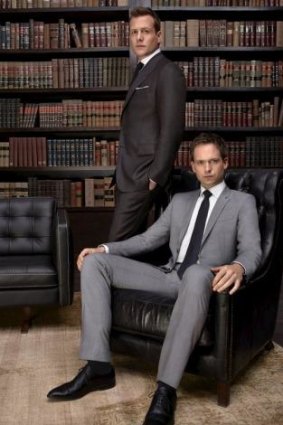 Slick: Gabriel Macht as Harvey Specter and Patrick J. Adams as Michael Ross in <i>Suits</i>.