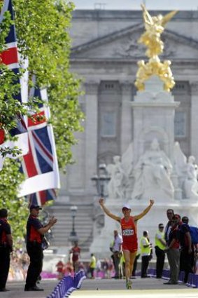 China's Chen Ding takes gold in men's 20km walk.