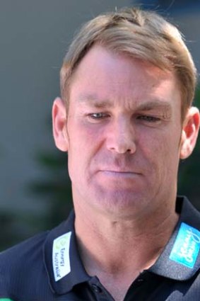 Fronting up ...  Shane Warne speaks after being sanctioned on Monday.