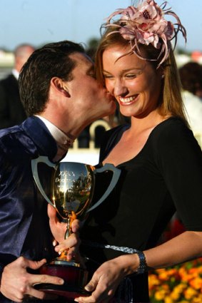 Danny Nikolic (left) with his former wife, Les Samba's daughter Victoria, after the jockey's victory in the Doomben Cup aboard Perlin in 2005.
