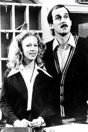 Cleese as beloved Basil in Fawlty Towers with Connie Booth.