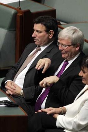 Kevin Rudd making hand motions during a division.