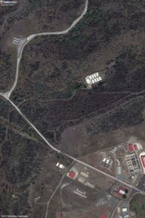 'The Marriott': A satellite image shows a portion of Naval Station Guantanamo Bay, Cuba, including the secret facility known as Penny Lane, upper middle in white, where terrorists were turned into double agents.