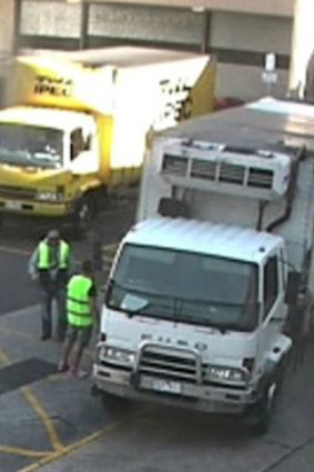 CCTV photos show two men in a white Mitsubishi Fuso truck collecting the televisions about 5pm on Friday afternoon.