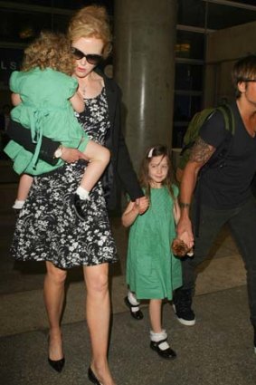 Nicole Kidman, Keith Urban and their daughters, Sunday Rose Kidman Urban and Faith Margaret Kidman Urban are seen at LAX airport on January 02, 2014 in Los Angeles, California.