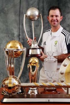 The spoils: Australian captain Ricky Ponting poses with the 2007 ICC Cricket World Cup trophy, the 2007 ICC Champions Trophy, The Ashes Trophy, the ICC One Day International Championship Trophy, the ICC Test Championship Trophy and the Border Gavaskar Trophy on July 2, 2007.