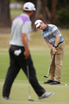 Chris Campbell  putts on the 18th green during day three of the Australian Masters.