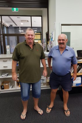 Bega Court registrar John Chalker (left) and court officer Paul McGrath (right) went to work on Monday unsure if their homes were still standing.
