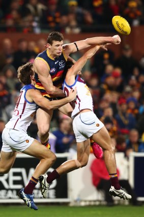 Josh Jenkins of the Crows competes for the ball.