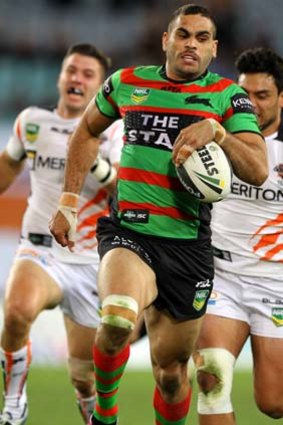 Greg Inglis shows the Tigers a clean pair of heels on the way to the tryline.