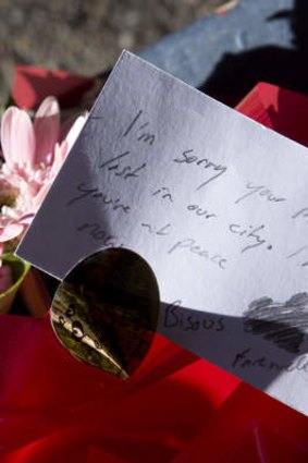 Flowers and message at the site where Sophie Collombet was found.