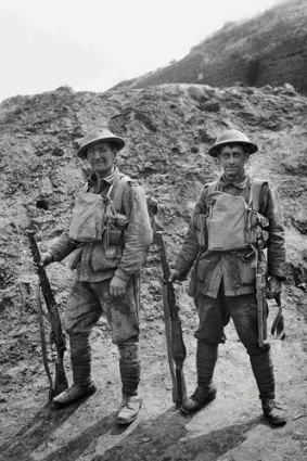 Hard-fought war ... Privates George Giles and John Anderton with their kit as they come out of battle.