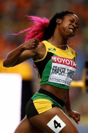 Shelly-Ann Fraser-Pryce of Jamaica celebrates winning gold in the 100 metres.
