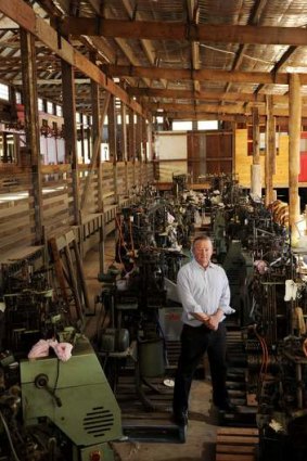 Peter Crisp stands amongst some sock making machine's that sit in his restored Shearing Shed that he hopes will become the Yass Valley Woollen Mill at his Bowning property. Bowning.