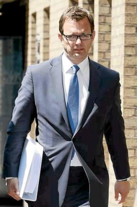 Former <i>News of the World</i> editor and PM's media adviser Andy Coulson leaves Southwark Crown Court in central London.