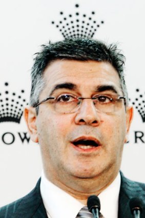 AFL chief Andrew Demetriou will lobby federal MP Andrew Wilkie to find alternatives to mandatory pre-commitments on poker machines.