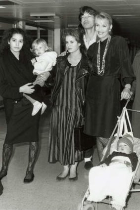 Hall and Mick Jagger in 1986 with their children and stepchildren Karis, Elizabeth, Scarlett, Jade and baby James.