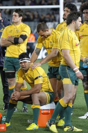 A bunch of disconsolate Wallabies after being beaten by the All Blacks in Auckland.