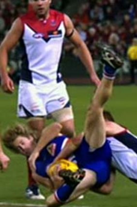 A bit rough: Jack Trengove won a free kick for his tackle on Callan Ward.