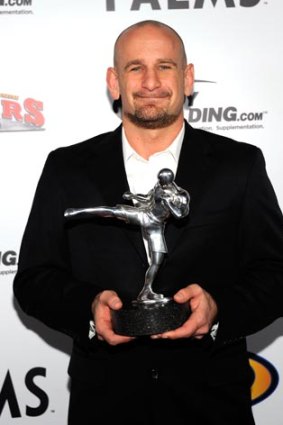 Mixed martial arts trainer Greg Jackson holds the Coach of the Year award at the Fighters Only World Mixed Martial Arts Awards in Las Vegas in November last year.