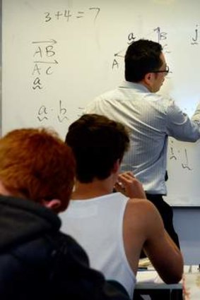 Teacher Wen Li takes specialist maths at the TSSM tutoring school in Flinders Street.