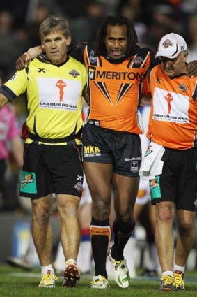 Out of action ... Lote Tuqiri's ankle injury will keep him off the field for at least  a month.