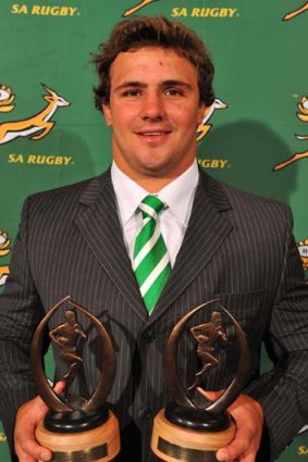 Heinrich Brussow poses with his awards for British and Irish Lions Provincial Player and Young Player of the Year 2009.