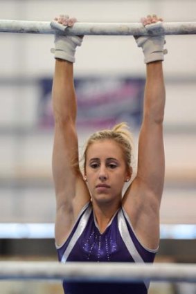 Ashleigh Brennan on the uneven bars.