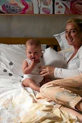 Finding balance: Nina Proudman with her baby daughter.