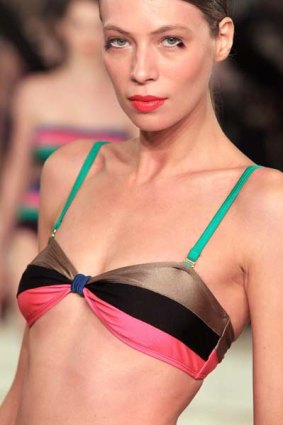 The centre of attention ... a model shows off  a C and M Swim  outfit during the David Jones spring/summer fashion collection launch yesterday. The models wore makeup by Shu Uemura's international make-up director Uchiide-San, who  flew in from Japan.