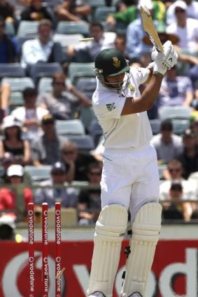 South Africa opener Alviro Petersen is bowled by Mitchell Starc.