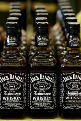 The maker of Jack Daniel's says taxes are choking its sales.