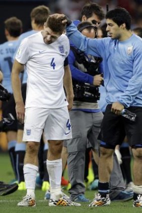 Steven Gerrard and former Liverpool teammate Luis Suarez after Uruguay's 2-1 over England at the 2014 World Cup.