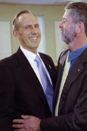 Bob Brown with partner Paul Thomas after his National Press Club address.